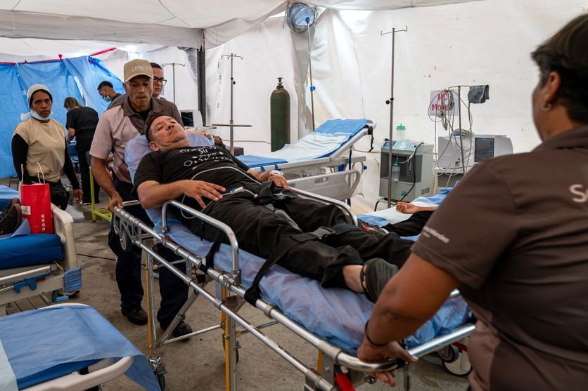 5e1050a1-a32e-475f-8858-be4c61c5cd7e Au Venezuela, des centres de soins improvisés après un séisme dévastateur