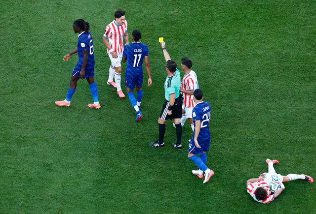 ed2031f4-6760-4ea7-9f6a-992ce6bf5ffb Le match France-Paraguay et l’arbitrage controversé