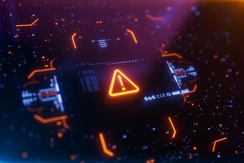 Warning icon on a digital LCD display with reflection. Les craintes liées aux risques existentiels de l’intelligence artificielle